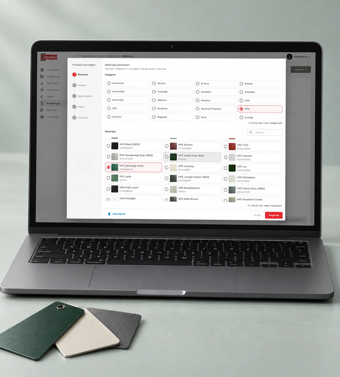 Generated product presentation of material selection in the Zetprofiel portal on a laptop, with a few colour samples in front